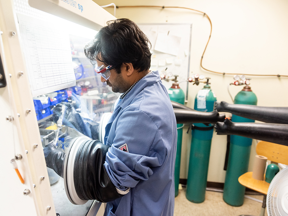 researcher working in glove box